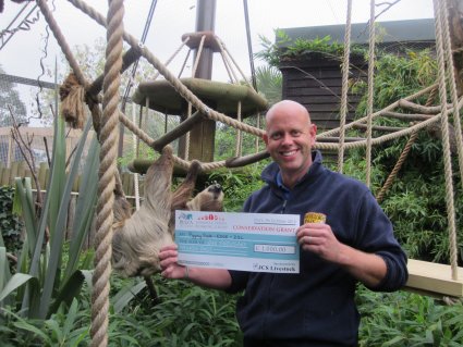 Mark_with_Sidone_the_sloth_at_Drusillas_Park_and_the___1000_grant_from_JCS_Livestock.JPG